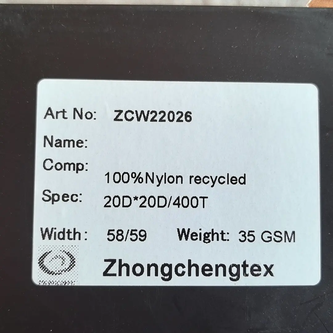 Wholesale 100% Recycled Nylon Plain Down Jacket Fabric Recycled Light Weight Fabric With Waterproof Coating